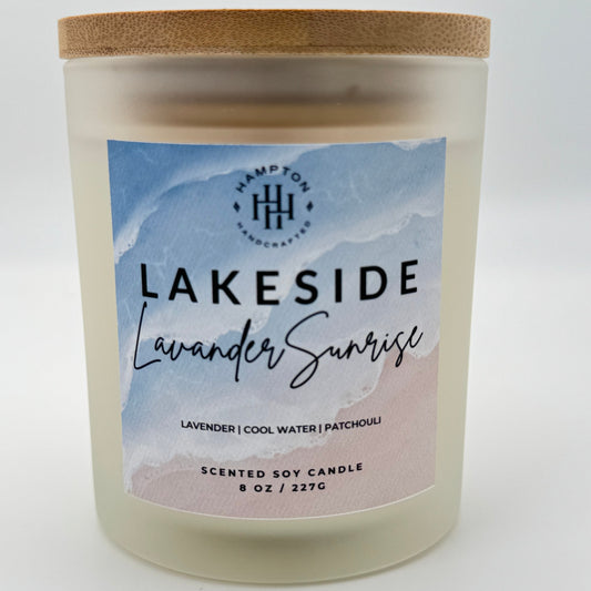 Candle with 'Lakeside Lavender Sunrise' label on a white background