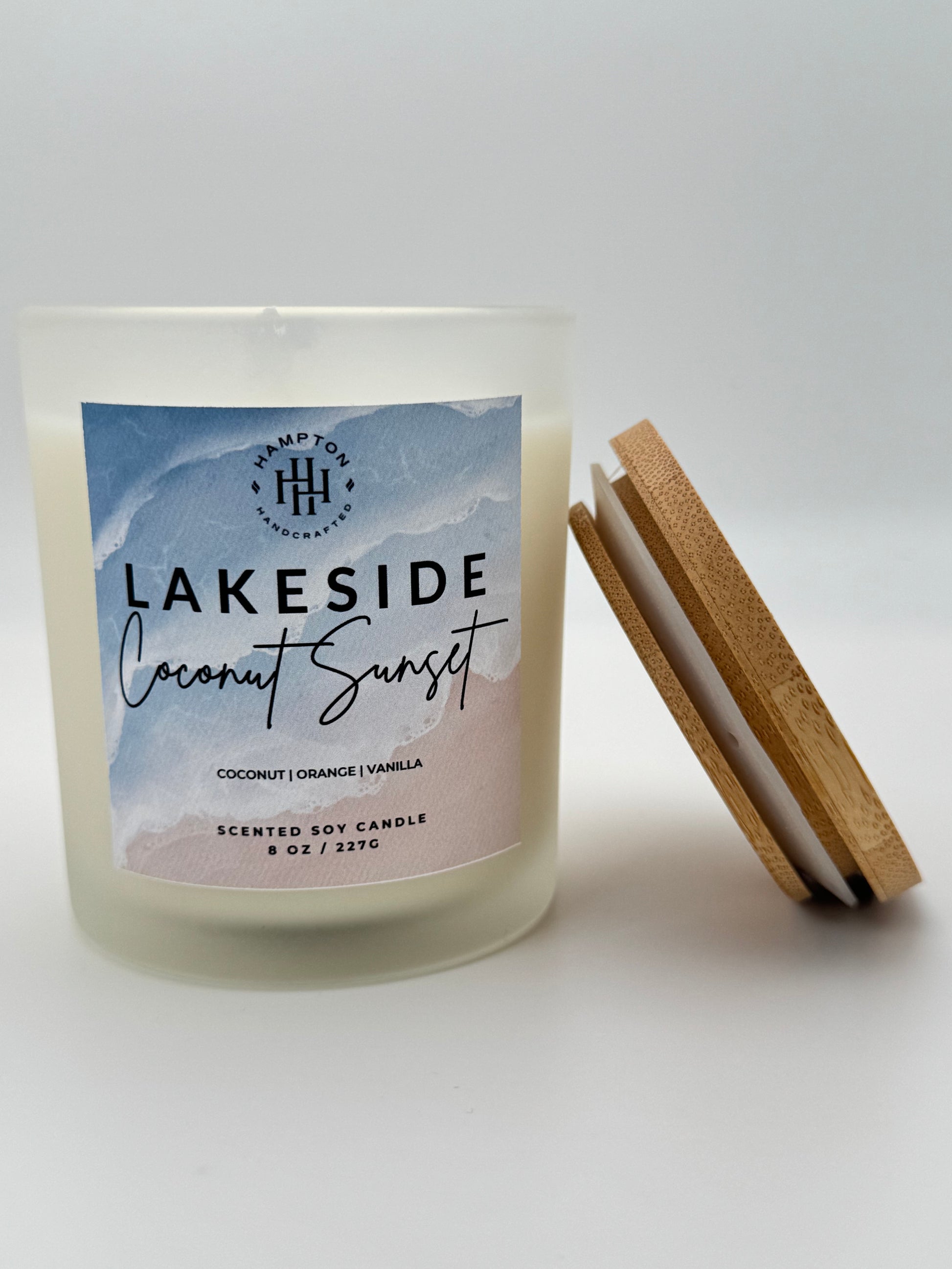 Lakeside Coconut Sunset candle packaging on a white background